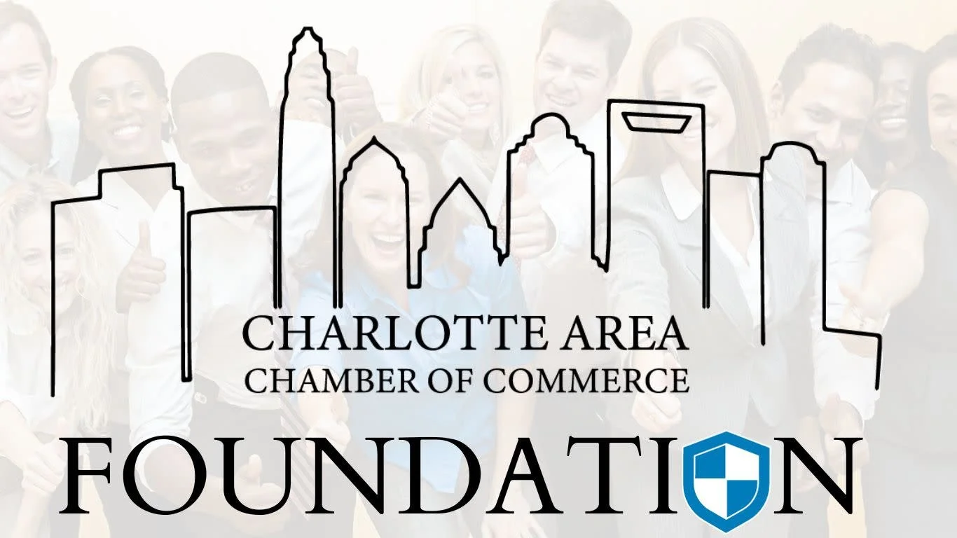 Overlay of a group of diverse smiling people with thumbs up, behind a line drawing of a cityscape, with the text "Charlotte Area Chamber of Commerce Foundation".